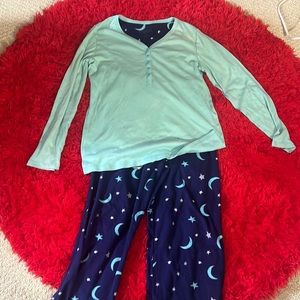 Blue children’s pajama set with moons and stars